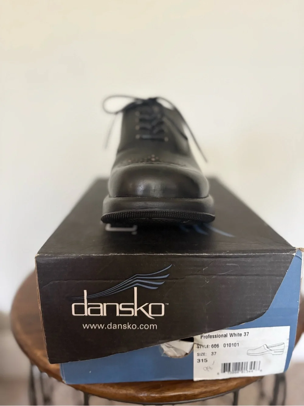 Dansko Black Leather Lace-Up Oxfords with Perforated Toe